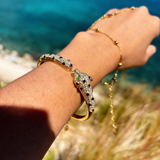 Gouden cuff armband panter