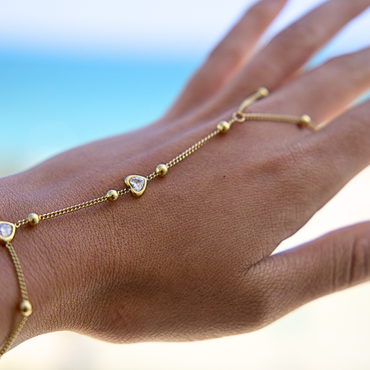 Golden hand chain hearts