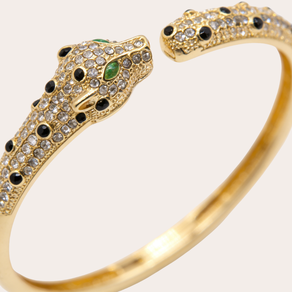 Gouden panter armband steentjes