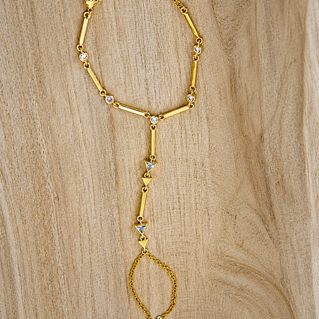 Golden hand chain stones