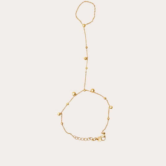 Oliva – gold hand chain with leaf crystals – Wear Celestials