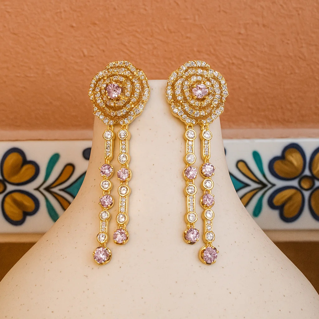 Lange camelia oorbellen goud