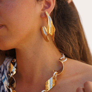 Golden hammered hoops and golden necklace