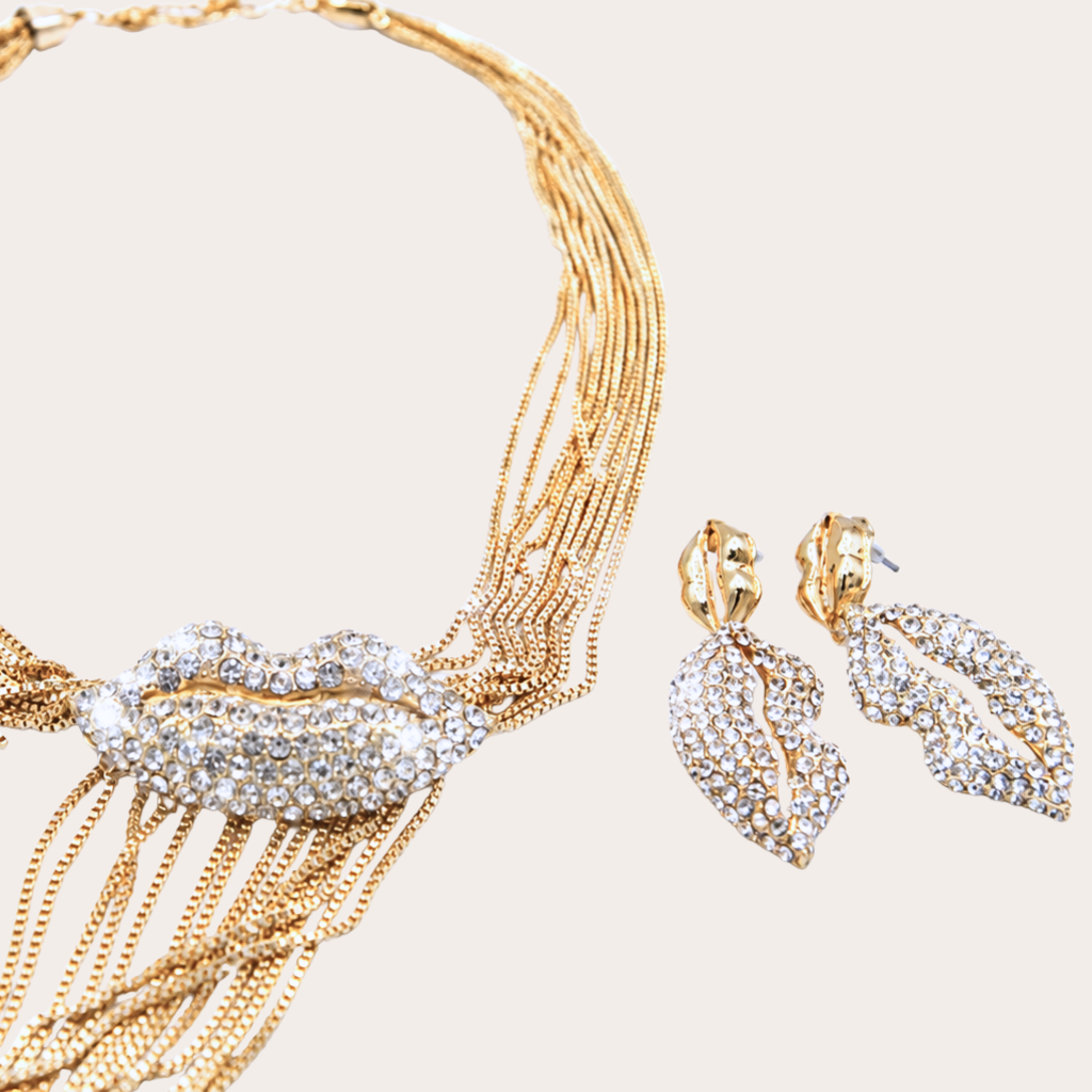 Gouden statement set oorbellen en ketting