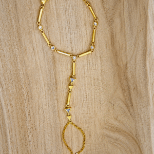 Golden hand chain stones