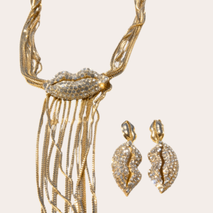 Gouden statement set met steentjes, oorbellen en ketting, mond